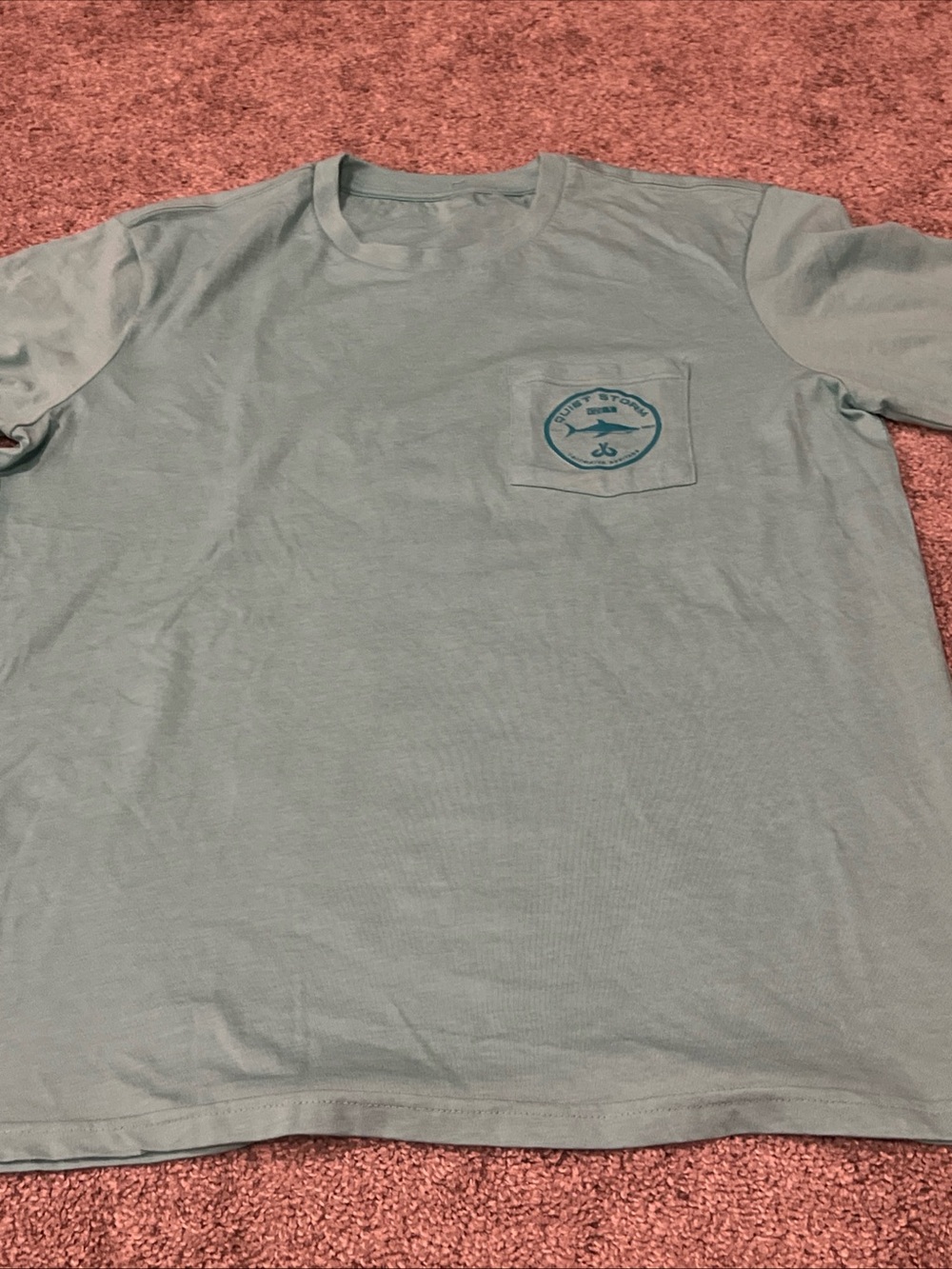 Men's Short-Sleeve Pocket Tee in Light Teal with Quiet Storm Shark logo